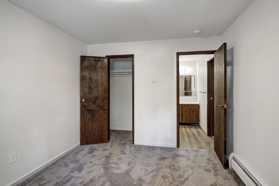 112 La Bonte Street, Unit 208 Dillon, CO 80435 - Photo 16 of 25 an empty room with closet and a bathroom