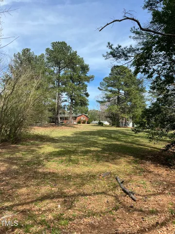 an aerial view of a houses of a yard