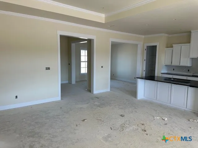 a view of a kitchen with an empty space