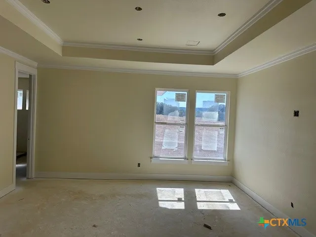 an empty room with windows