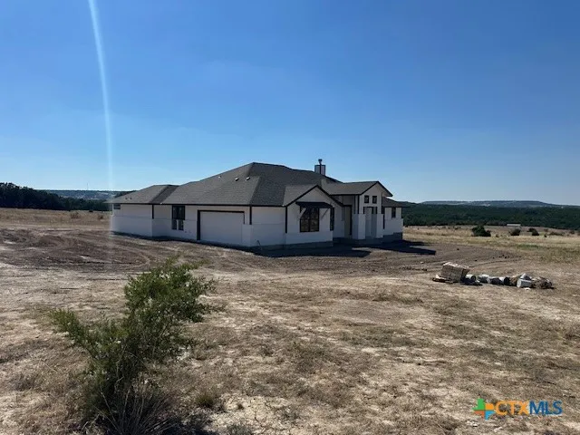 a house view with a outdoor space