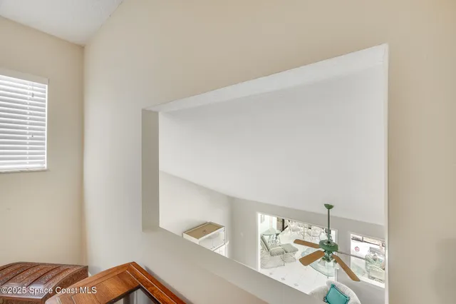 a bathroom with a granite countertop sink mirror and a shower