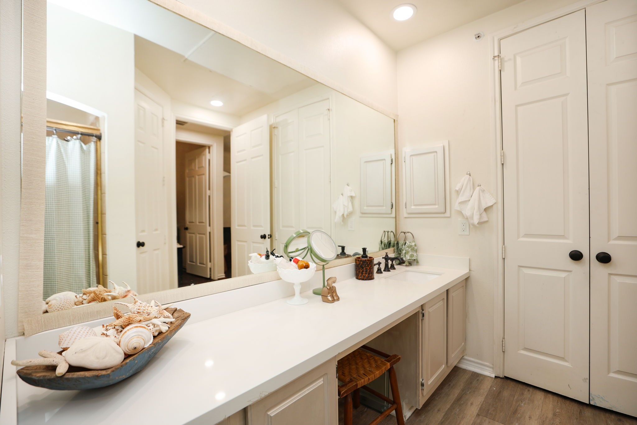 2400 South McCue Road, Unit 104 Houston, TX 77056 - Photo 20 of 38 View from shower area looking into bathroom and W/D to right ot counter top.