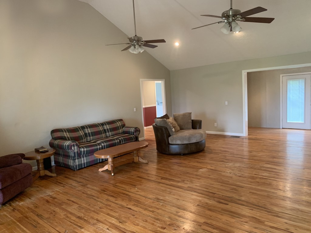579 Rocky Road Liberty, TN 37095 - Photo 26 of 44 a living room with furniture and a wooden floor