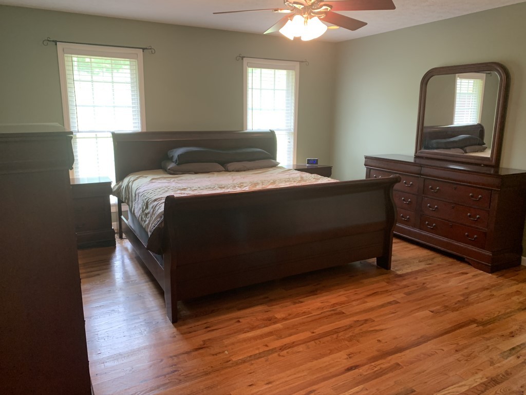 579 Rocky Road Liberty, TN 37095 - Photo 35 of 44 a bed sitting in a bedroom next to a window