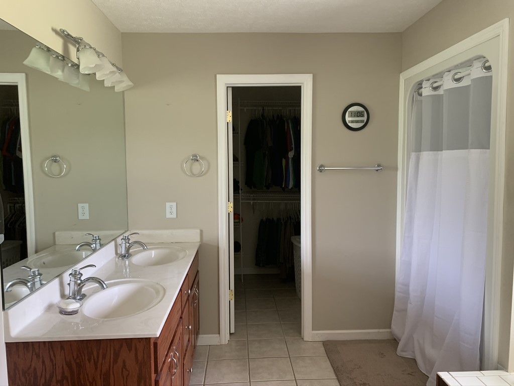 579 Rocky Road Liberty, TN 37095 - Photo 37 of 44 a bathroom with a sink and a mirror