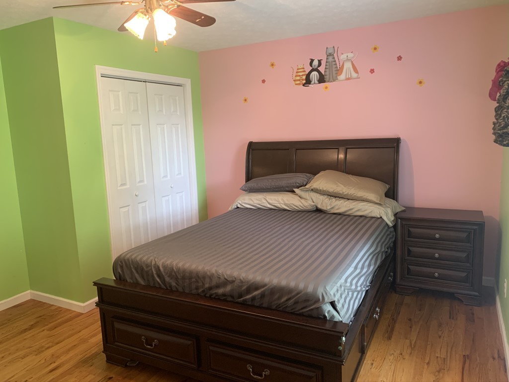 579 Rocky Road Liberty, TN 37095 - Photo 41 of 44 a bedroom with a bed and a dresser