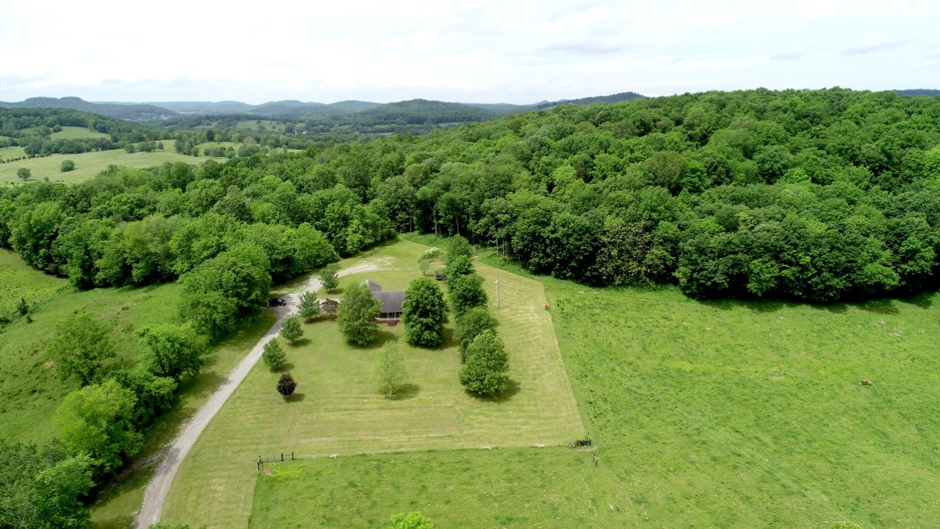 579 Rocky Road Liberty, TN 37095 - Photo 9 of 44 a view of a garden with a fountain