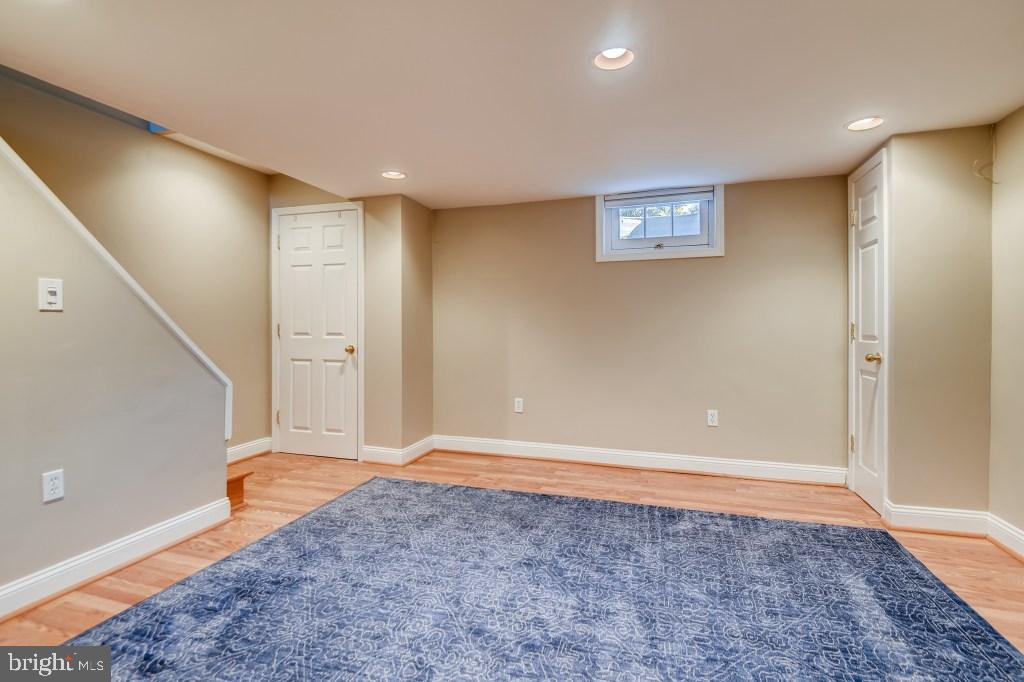 1605 Hardwick Road Towson, MD 21286 - Photo 23 of 32 Neutral colors in family room / windows too