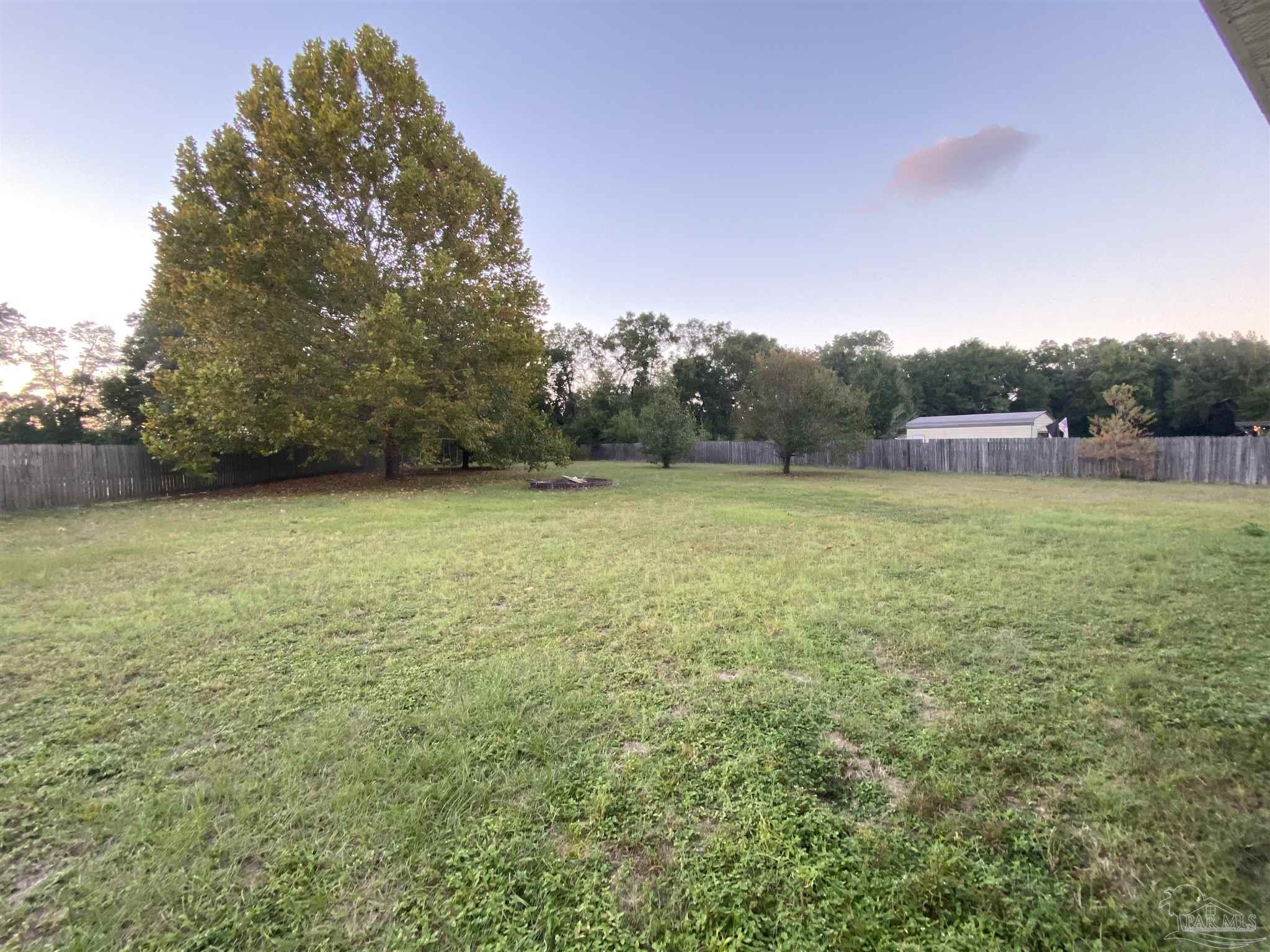 5493 Riviera Drive Milton, FL 32583 - Photo 15 of 21 a view of outdoor space and yard