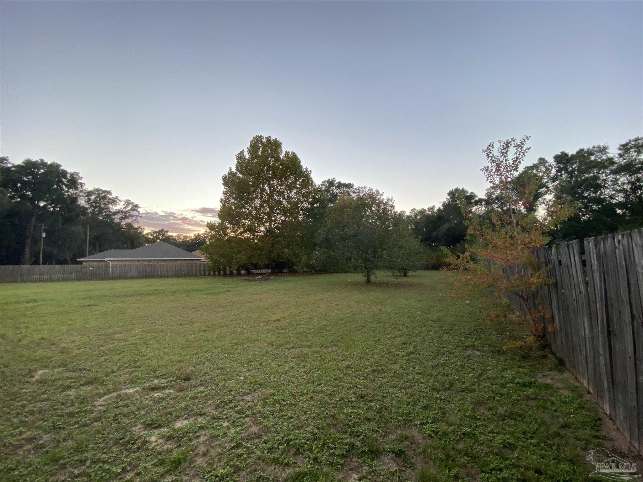 5493 Riviera Drive Milton, FL 32583 - Photo 16 of 21 a view of outdoor space and yard