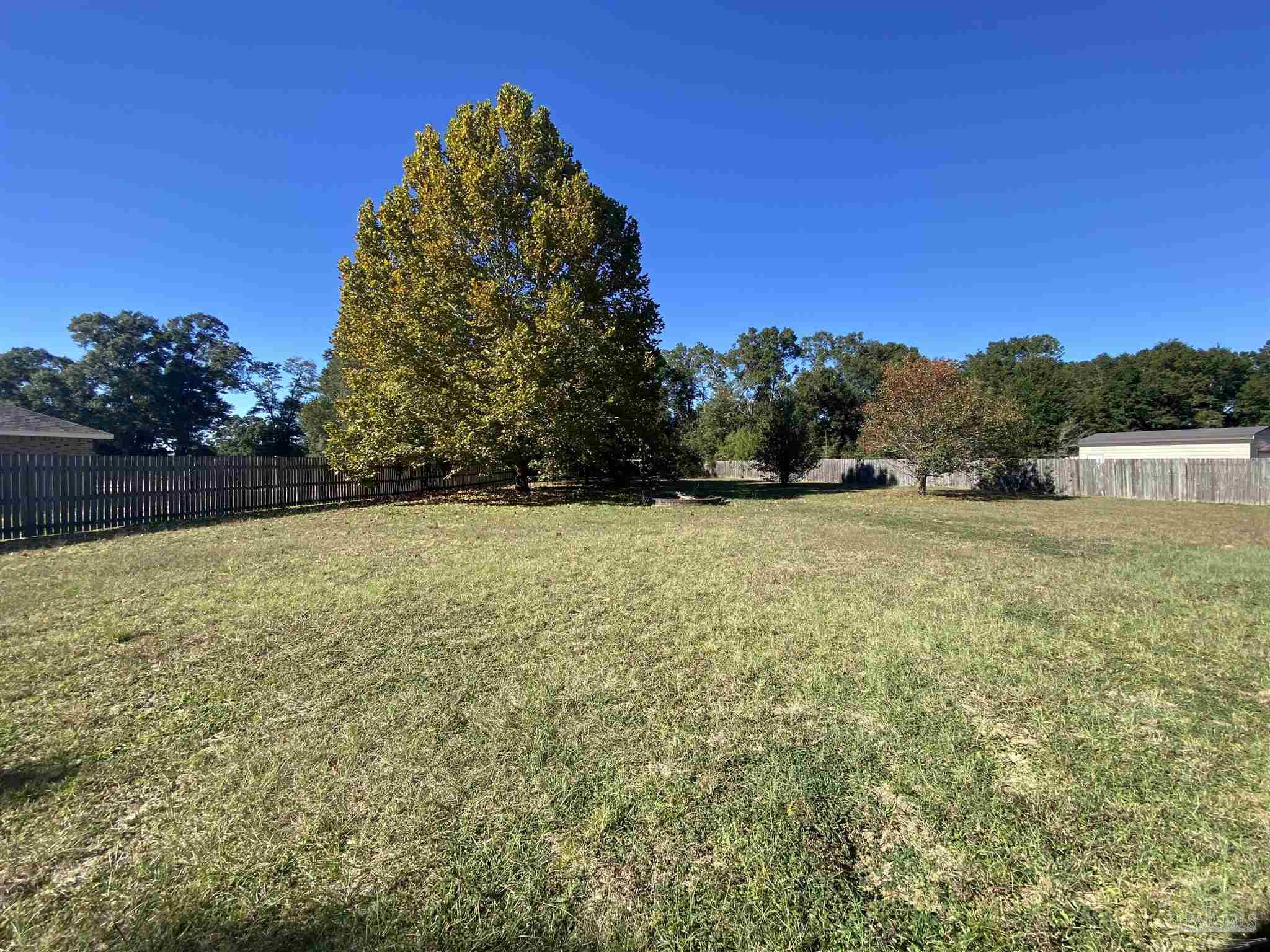 5493 Riviera Drive Milton, FL 32583 - Photo 19 of 21 a view of outdoor space and yard