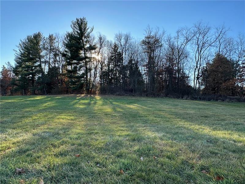 418 Myoma Road Mars, PA 16046 - Photo 8 of 14 a view of a field of grass and trees