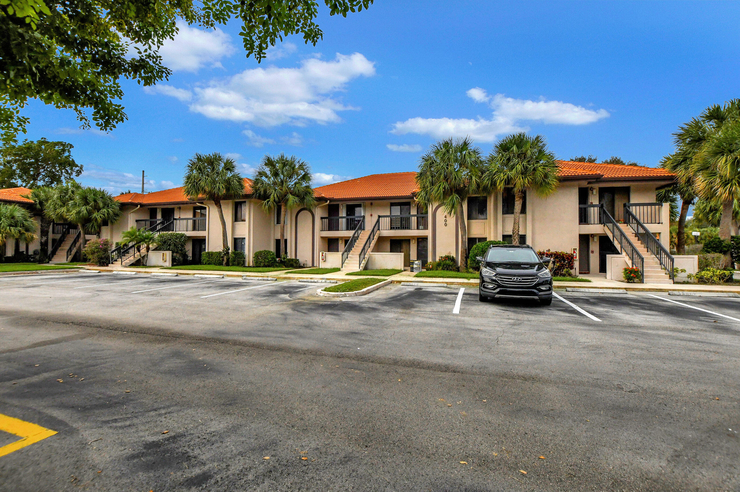 400 Club Circle, Unit 106 Boca Raton, FL 33487 - Photo 1 of 28 Front