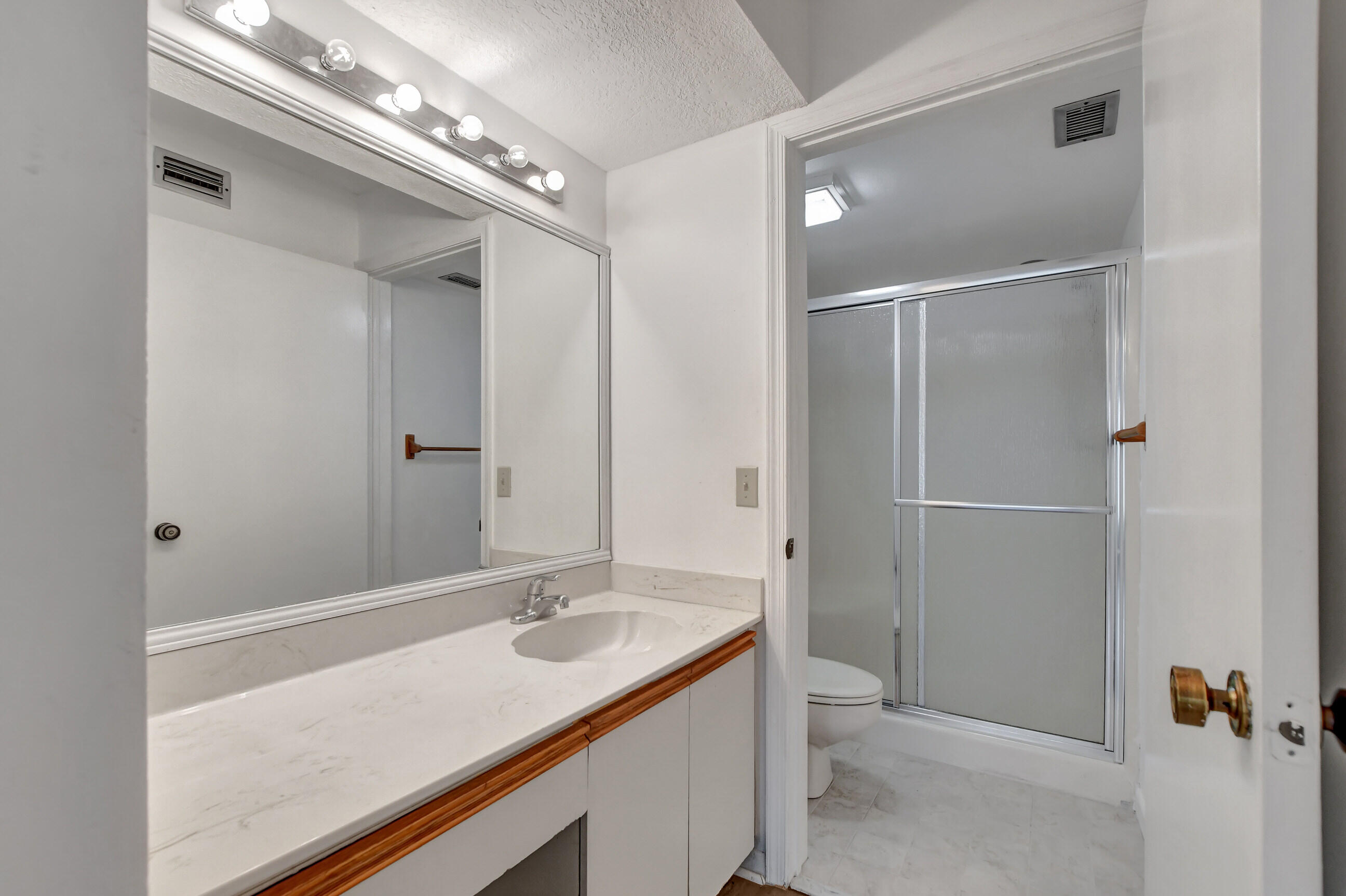 400 Club Circle, Unit 106 Boca Raton, FL 33487 - Photo 16 of 28 Master bathroom 1
