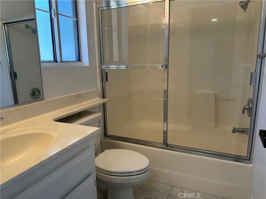 201 Laurel Avenue, Unit 6 Brea, CA 92821 - Photo 14 of 24 a bathroom with a sink toilet and shower