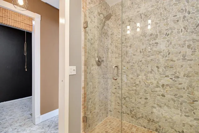 a bathroom with a sink a toilet a mirror and vanity