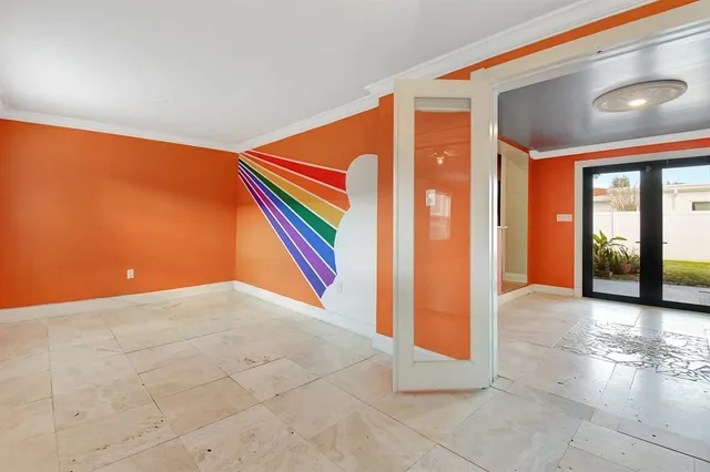 a view of a livingroom with furniture and a window