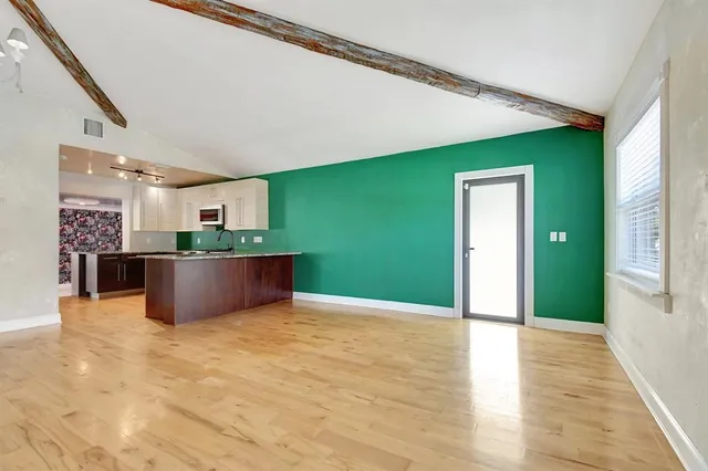 a view of a kitchen with a sink