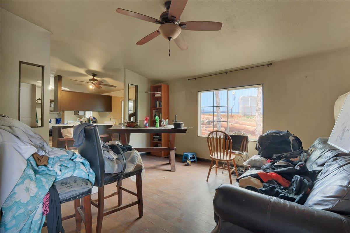 10447 Texas Hill Road Dobbins, CA 95935 - Photo 18 of 55 a living room with furniture and a large window