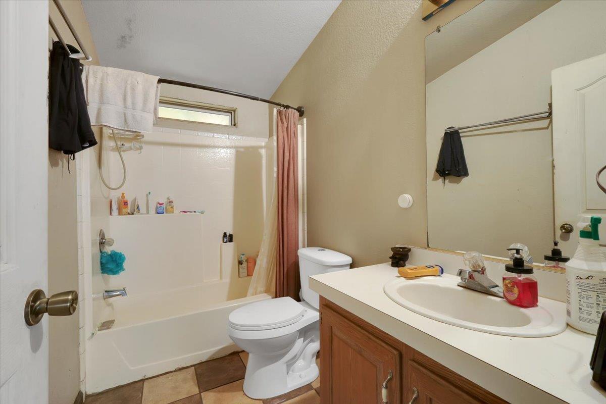 10447 Texas Hill Road Dobbins, CA 95935 - Photo 21 of 55 a bathroom with a sink toilet and shower