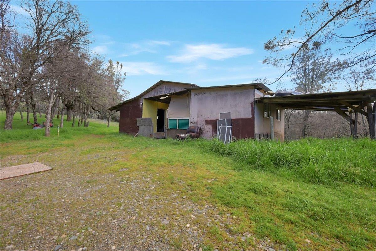 10447 Texas Hill Road Dobbins, CA 95935 - Photo 29 of 55 a view of a house with a yard
