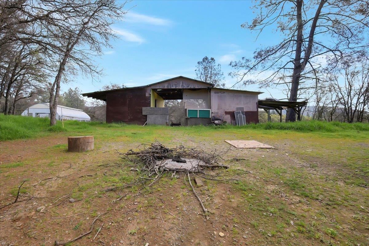 10447 Texas Hill Road Dobbins, CA 95935 - Photo 30 of 55 a view of a house with a yard covered in snow