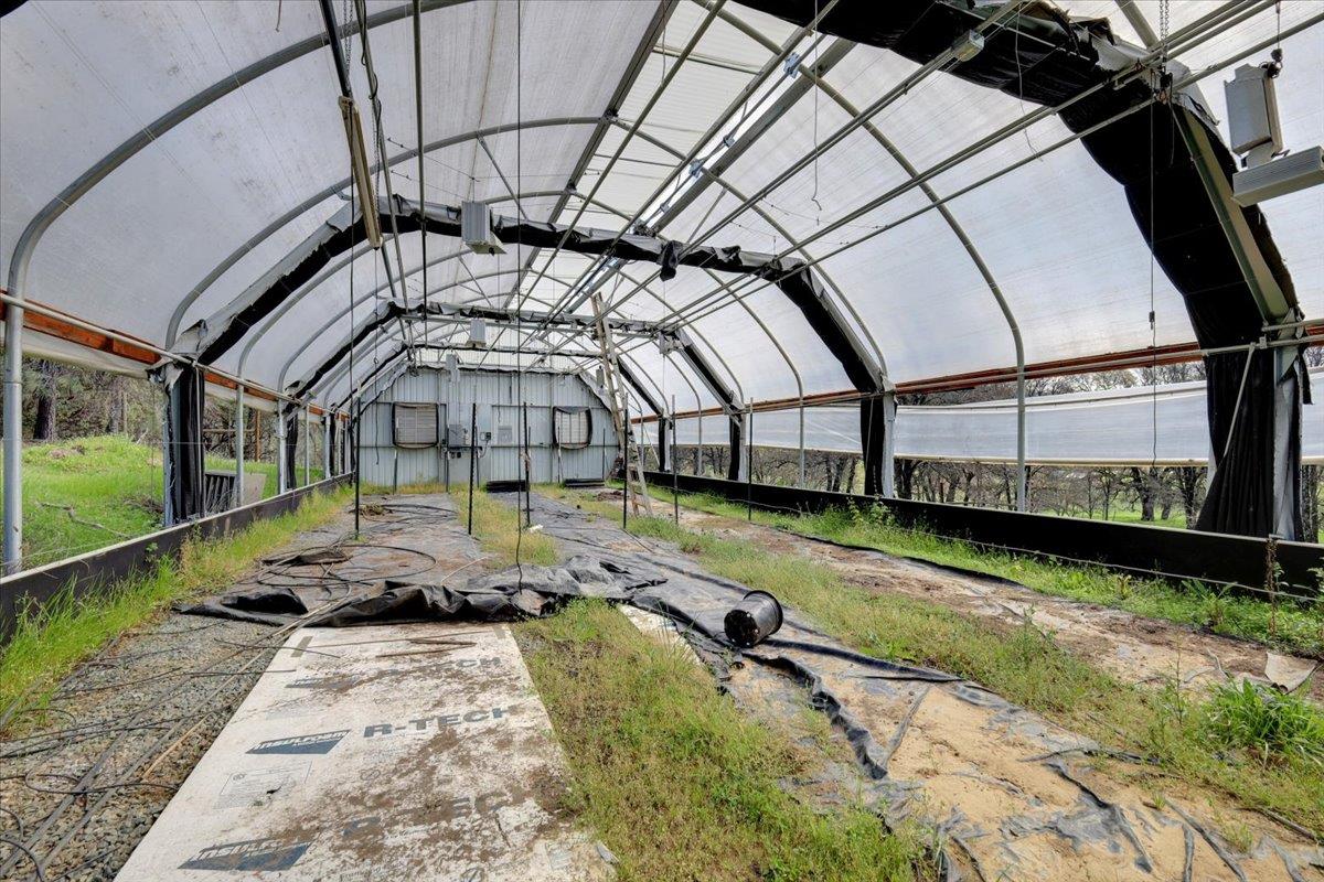 10447 Texas Hill Road Dobbins, CA 95935 - Photo 36 of 55 a view of a swimming pool with a patio