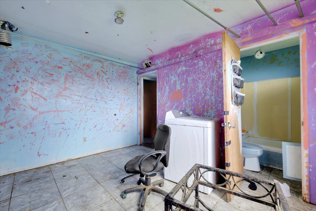 10447 Texas Hill Road Dobbins, CA 95935 - Photo 52 of 55 a room with furniture and a flat screen tv