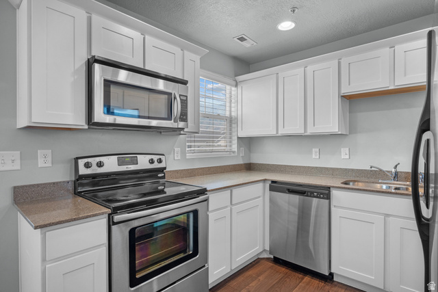 2457 West 500 South, Unit 2 Springville, UT 84663 - Photo 14 of 27 Kitchen featuring white shaker-style cabinetry & stainless steel appliances