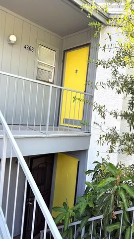 a view of balcony with a swimming pool