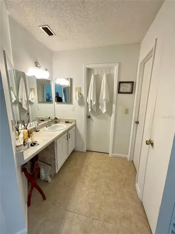 a view of utility room with a sink