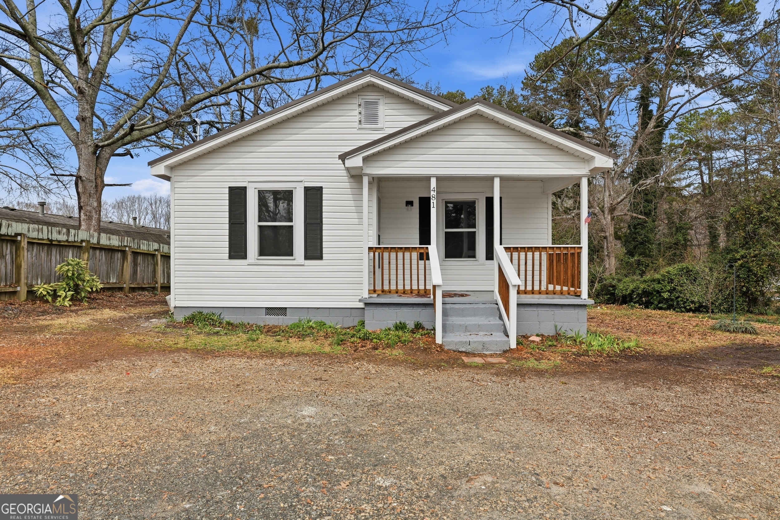 481 Collins Road Toccoa, GA 30577 - Photo 2 of 54 a view of a house with a yard and wooden fence