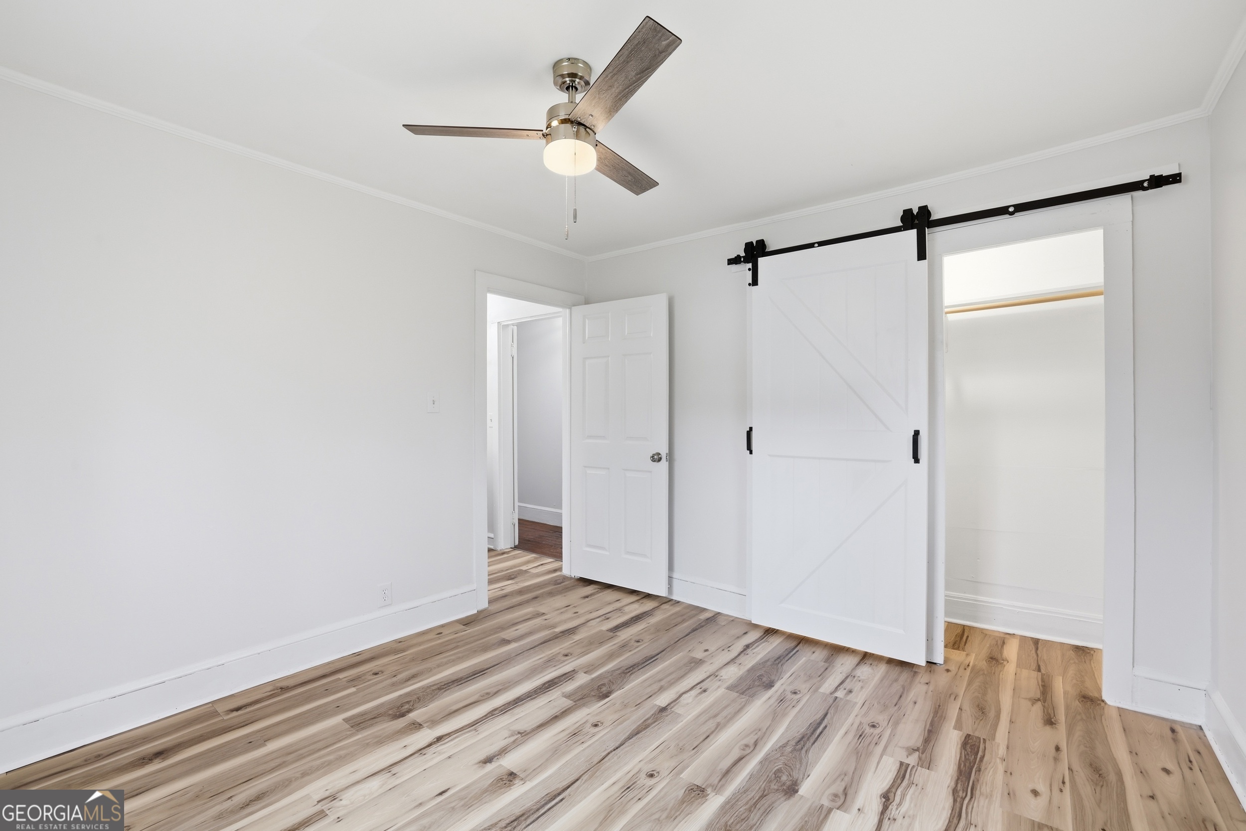 481 Collins Road Toccoa, GA 30577 - Photo 28 of 54 a view of empty room with wooden floor