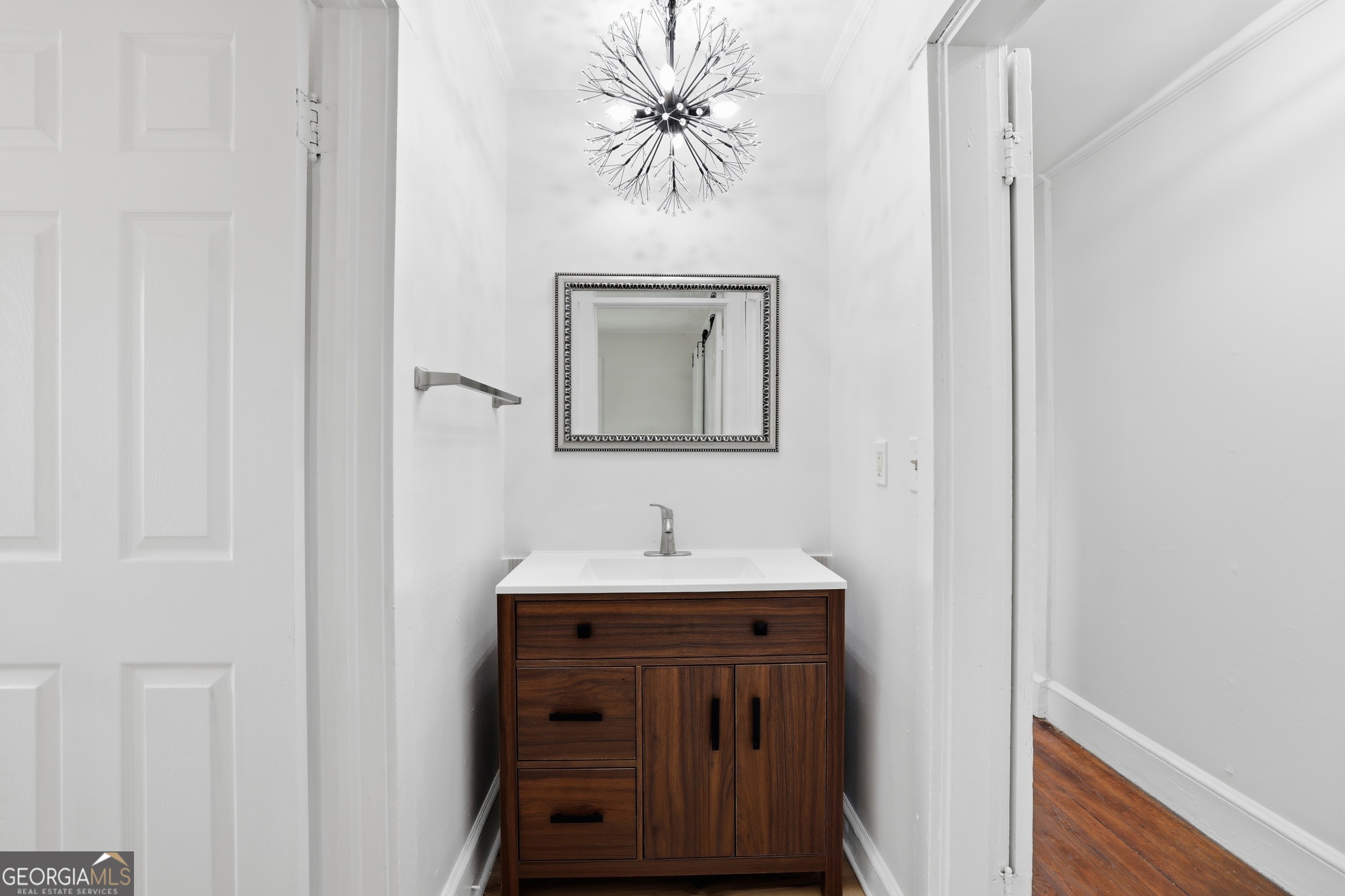 481 Collins Road Toccoa, GA 30577 - Photo 32 of 54 a bathroom with a sink and a mirror