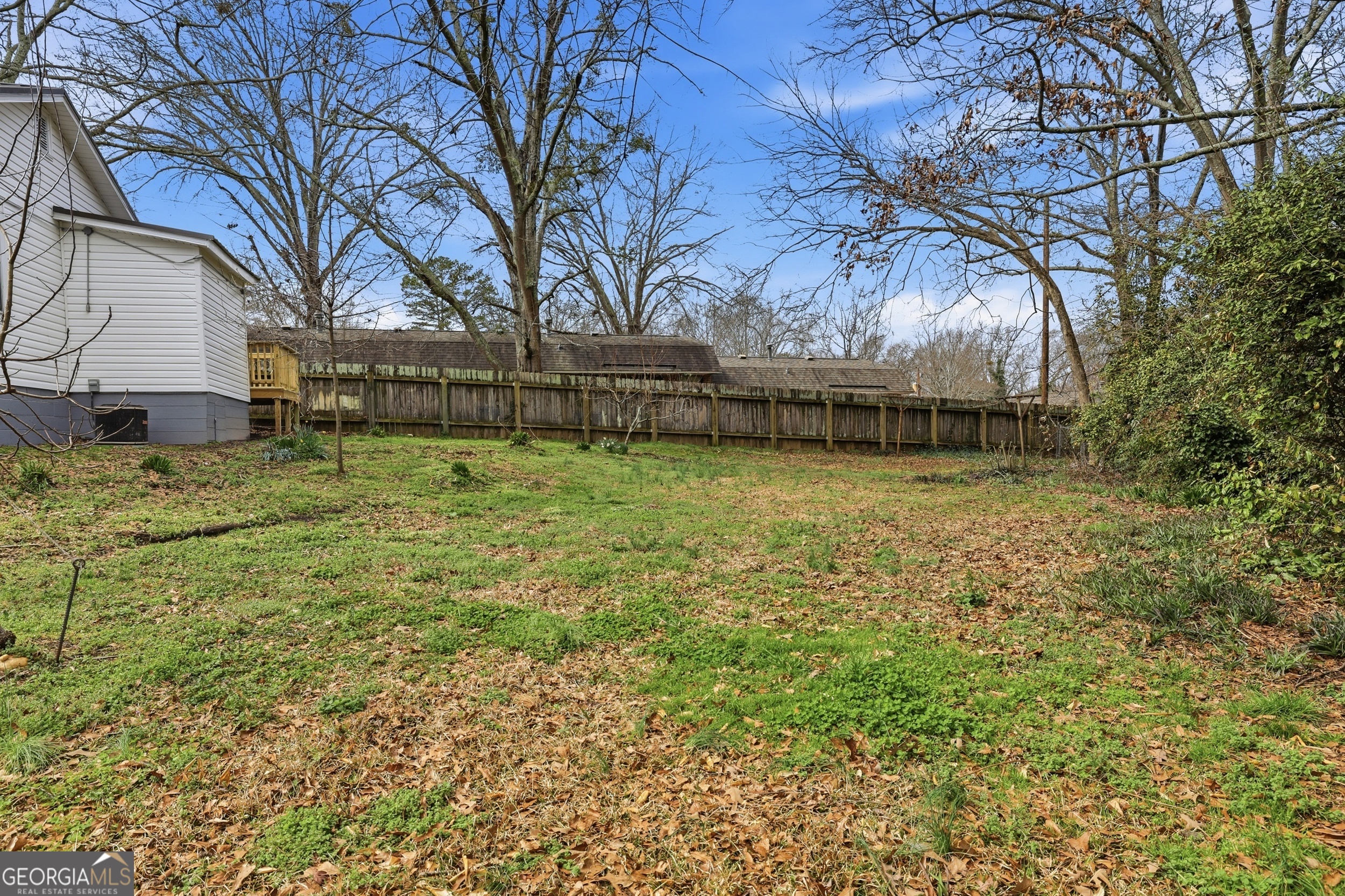481 Collins Road Toccoa, GA 30577 - Photo 8 of 54 a backyard of a house with lots of green space