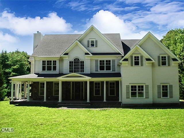 143 North Seir Hill Road Norwalk, CT 06850 - Photo 1 of 1 a front view of a house with a garden