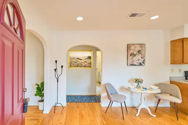 a living room with furniture and a table