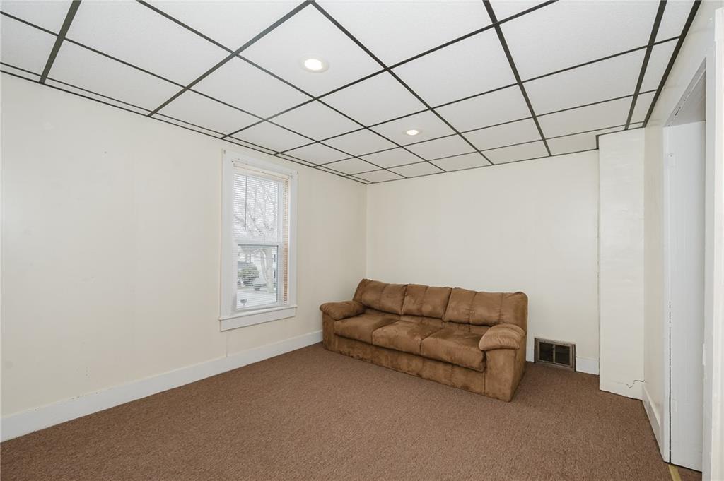 4992 Richmond Road Rochester Mills, PA 15771 - Photo 26 of 34 a living room with furniture and a window