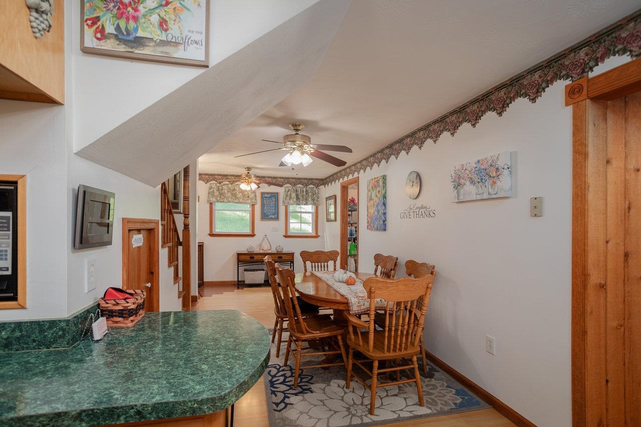 279 Helms Road Stanley, VA 22851 - Photo 22 of 64 a view of a dining room with furniture