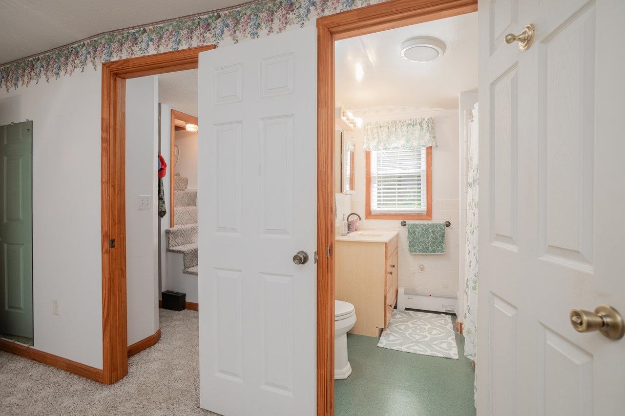 279 Helms Road Stanley, VA 22851 - Photo 32 of 64 a view of a bathroom with a shower and a sink