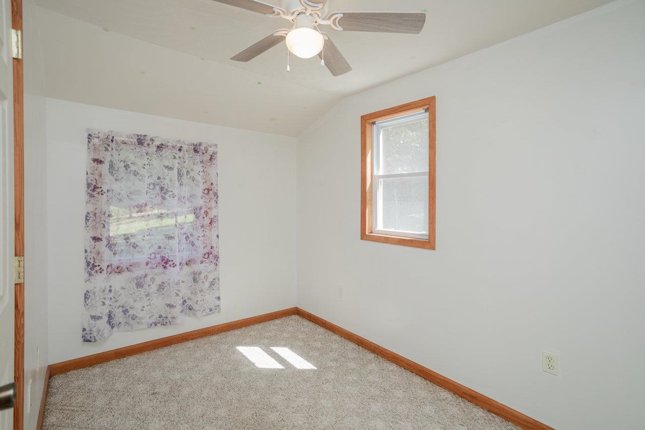279 Helms Road Stanley, VA 22851 - Photo 36 of 64 a view of a hallway with a large window
