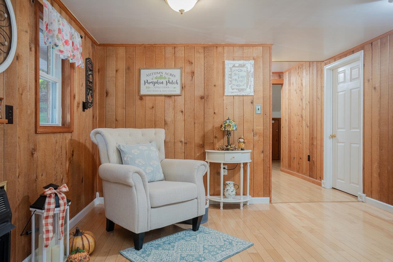 279 Helms Road Stanley, VA 22851 - Photo 10 of 64 a living room with furniture and wooden floor