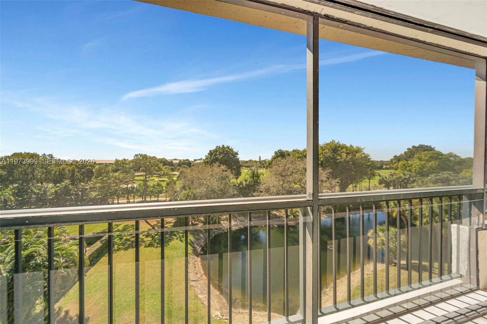 Amazing view of Golf course and lake from your enclosed balcony