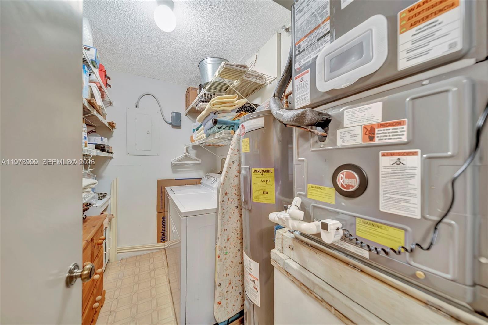6620 Boca Del Mar Drive, Unit 502 Boca Raton, FL 33433 - Photo 38 of 52 Separate laundry room in unit with storage and NEW A/C Unit