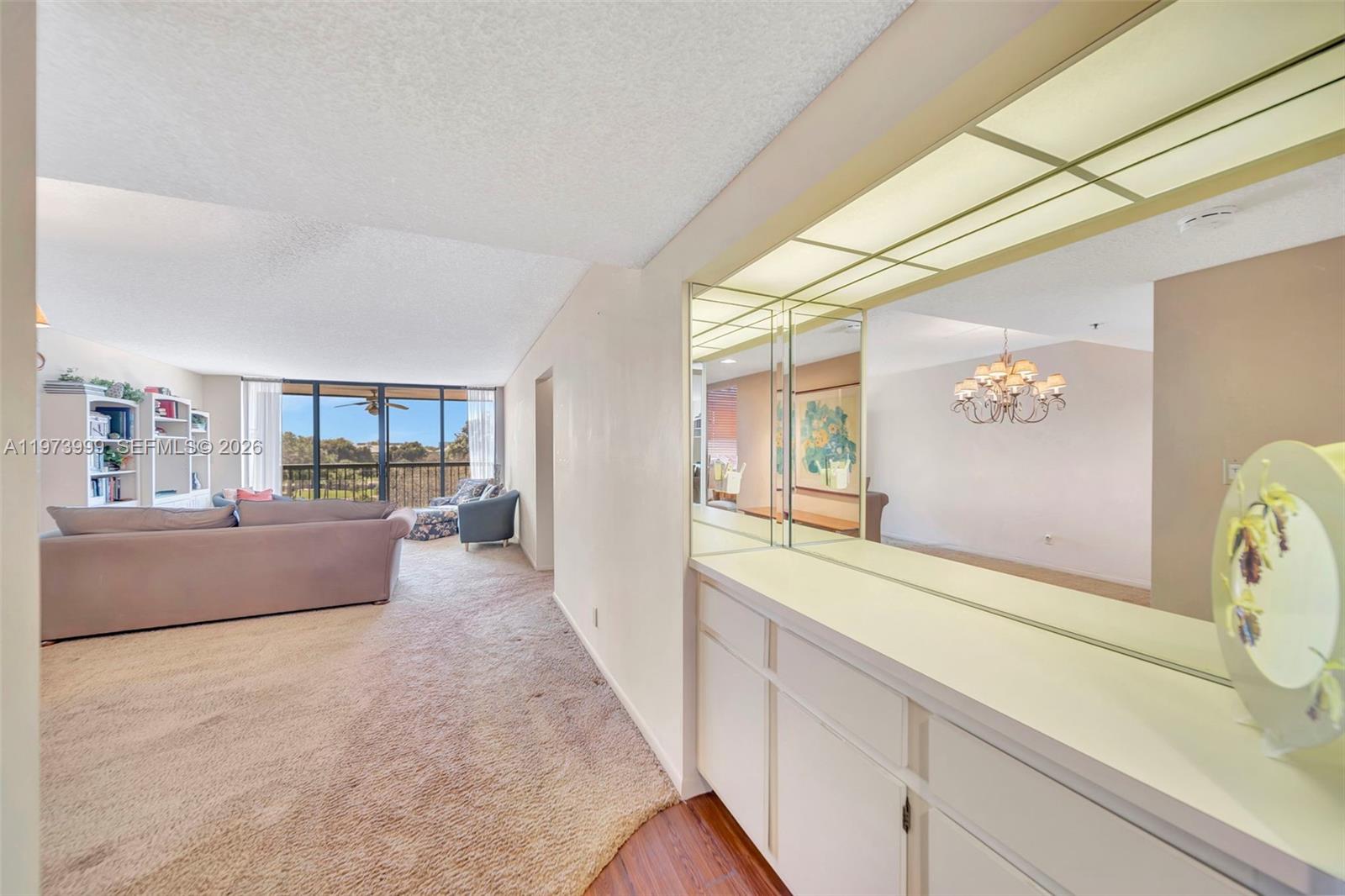 6620 Boca Del Mar Drive, Unit 502 Boca Raton, FL 33433 - Photo 8 of 52 Bar unit in foyer entry adjacent to dining room