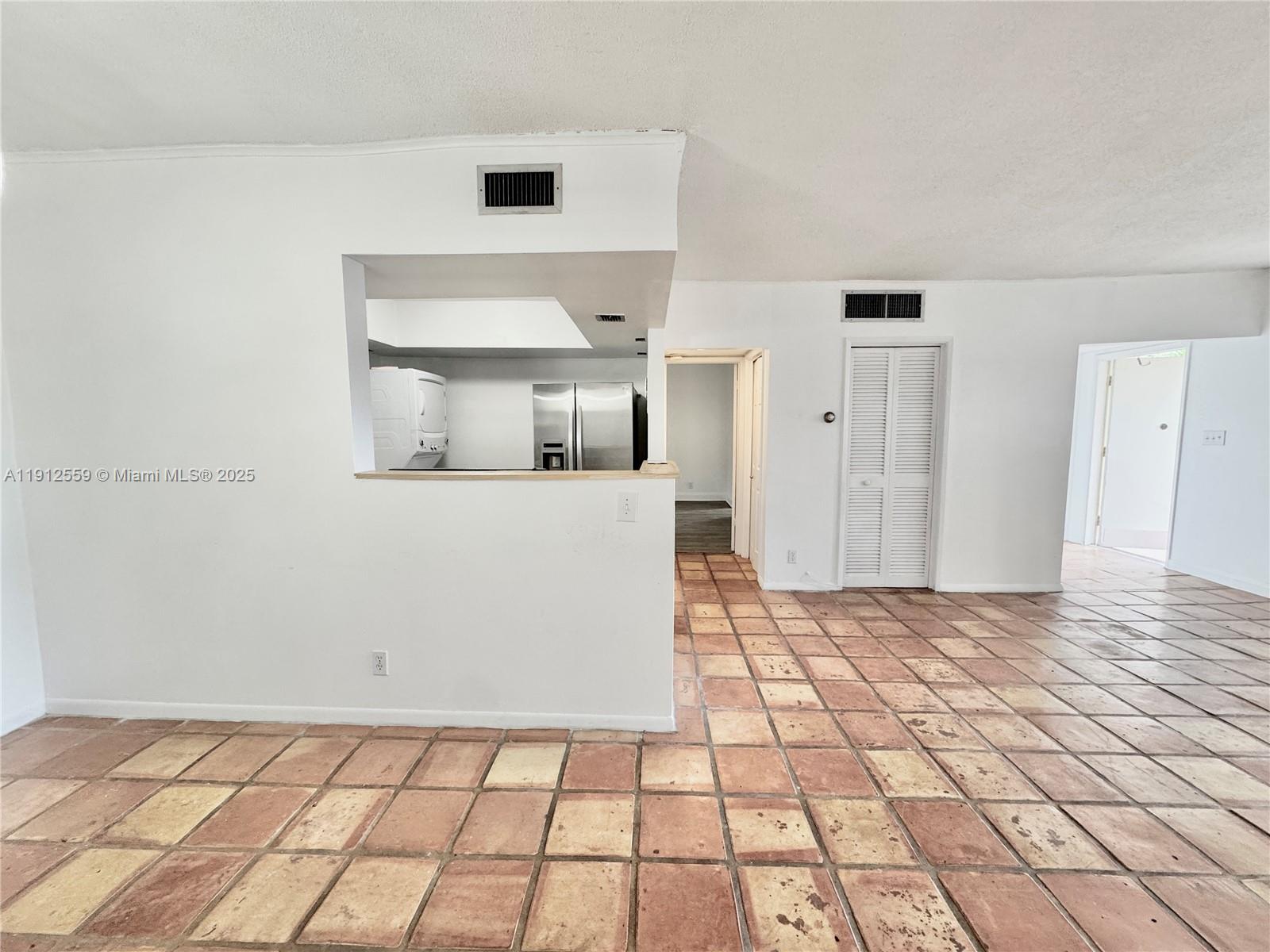 14901 Southwest 4th Street, Unit 5A Pembroke Pines, FL 33027 - Photo 7 of 21 a view of kitchen with utility