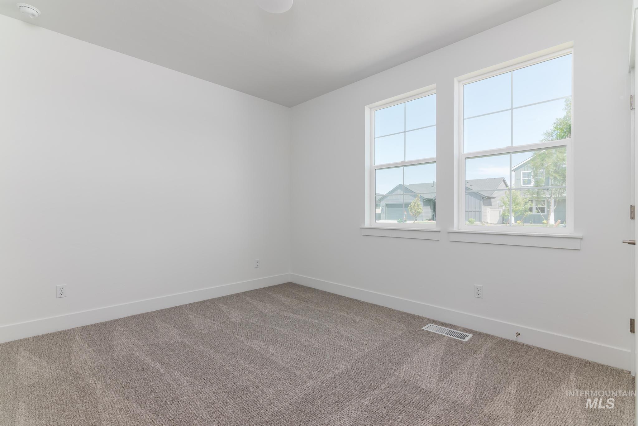 6285 West Snow Currant Street Meridian, ID 83646 - Photo 20 of 26 Bright interior space with two large windows