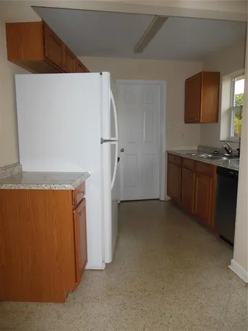 a view of a kitchen with a sink
