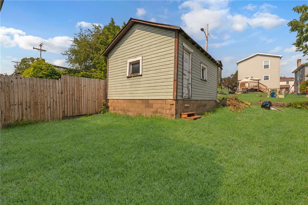 473 Irvin Avenue Rochester, PA 15074 - Photo 17 of 18 a view of backyard with small cabin